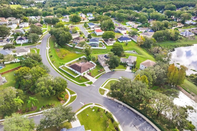aerial view featuring a residential view and a water view