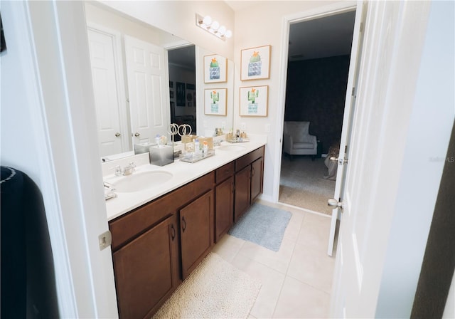 bathroom with vanity and tile patterned flooring