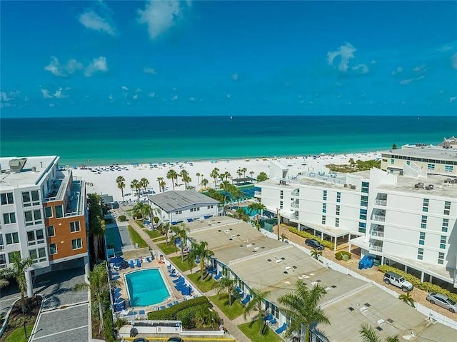 aerial view with a water view and a view of the beach