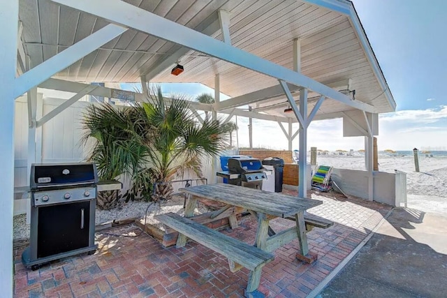 view of patio featuring a grill