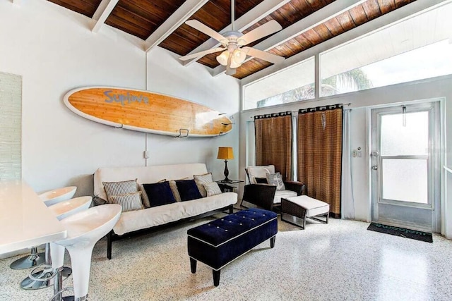 living room with light speckled floor, high vaulted ceiling, beam ceiling, and wood ceiling