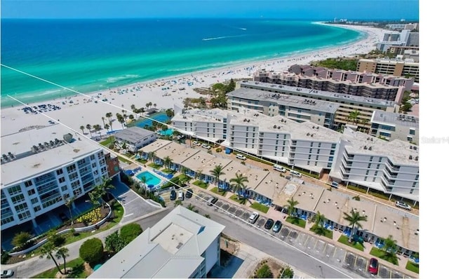 aerial view with a view of city, a water view, and a view of the beach