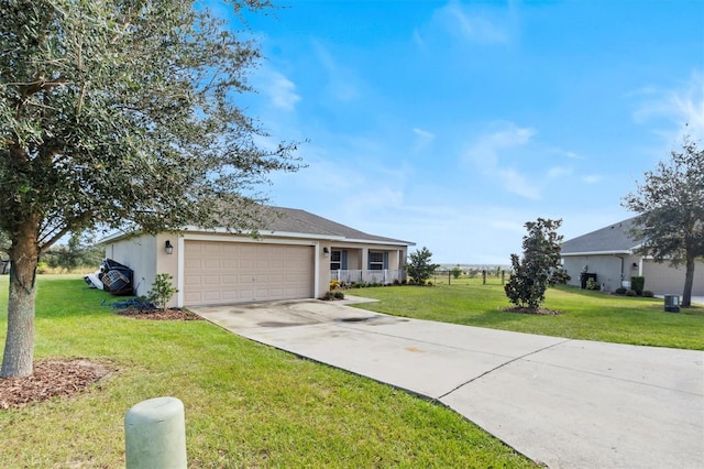 ranch-style house with a front yard and a garage