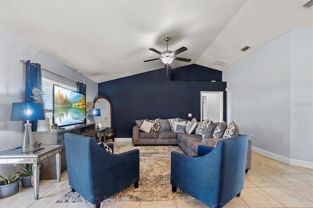 tiled living room featuring lofted ceiling and ceiling fan