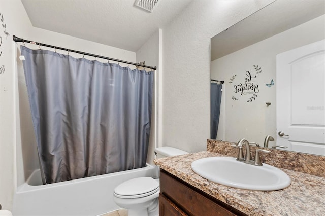 full bathroom with toilet, a textured ceiling, shower / tub combo with curtain, and vanity