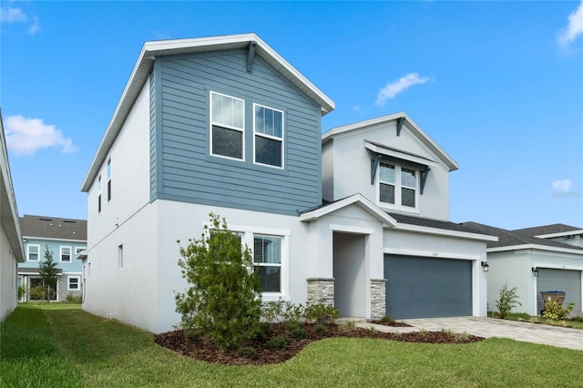 view of front of home with stucco siding, concrete driveway, a front yard, a garage, and stone siding