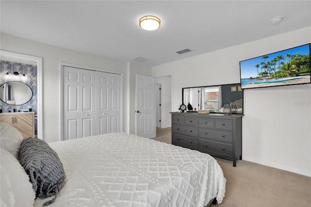 carpeted bedroom with a closet