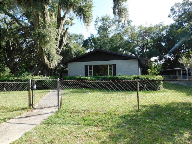 exterior space featuring a front lawn