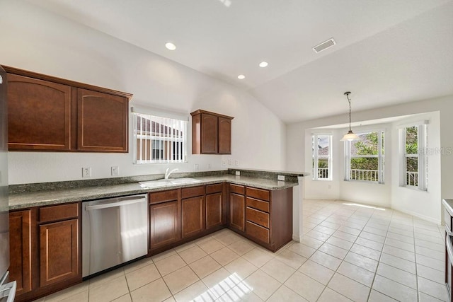 kitchen featuring sink, dishwasher, vaulted ceiling, pendant lighting, and light tile patterned floors