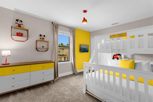 bedroom featuring light colored carpet