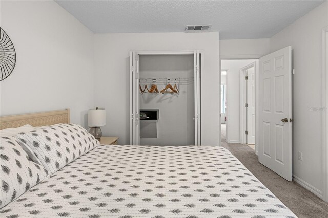 1029 Park Ridge Cir, Kissimmee, FL 34746 - carpeted bedroom with a closet and baseboards