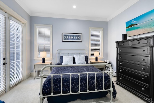 bedroom featuring crown molding and carpet flooring