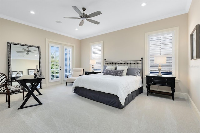 carpeted bedroom featuring ornamental molding, access to exterior, and ceiling fan