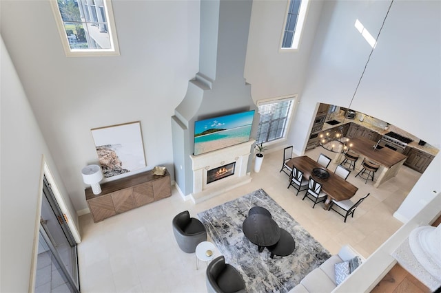 living room featuring a high ceiling