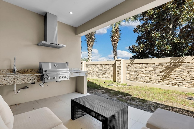 view of patio / terrace featuring sink and grilling area