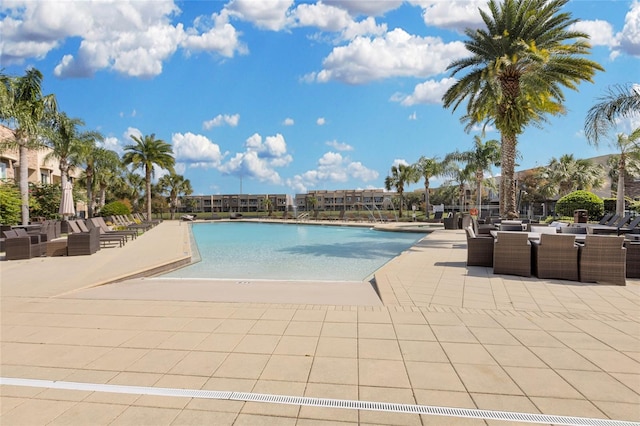 view of pool featuring a patio area