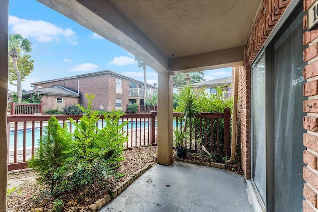 view of patio / terrace featuring a community pool