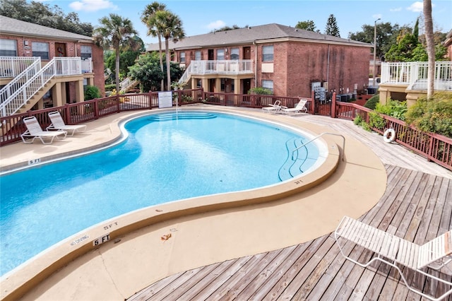 view of pool featuring a deck