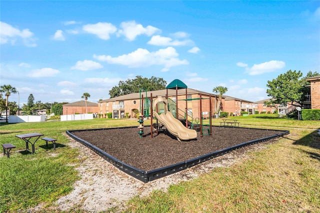 view of play area featuring a lawn