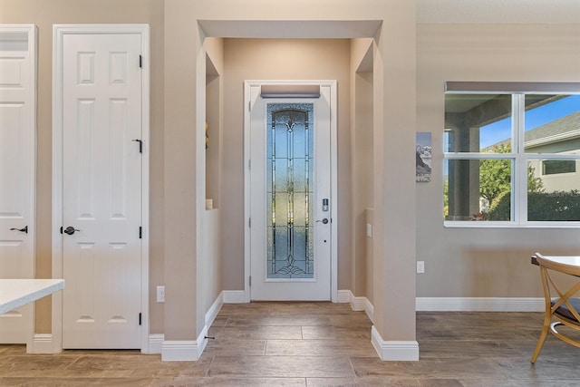 foyer with hardwood / wood-style floors