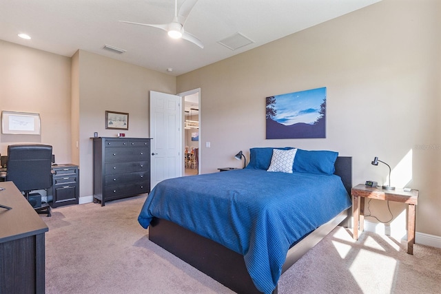 bedroom featuring ceiling fan and light colored carpet