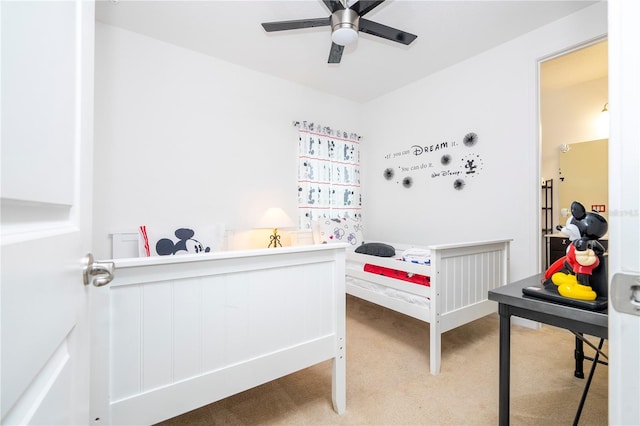 carpeted bedroom with ceiling fan