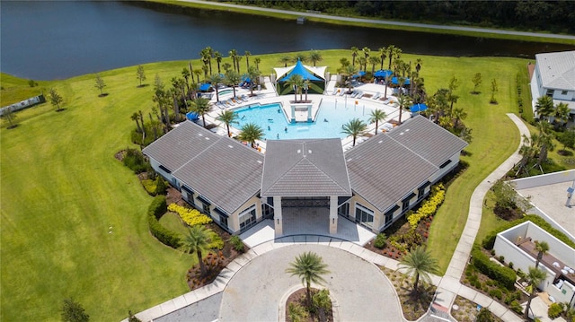 birds eye view of property featuring a water view