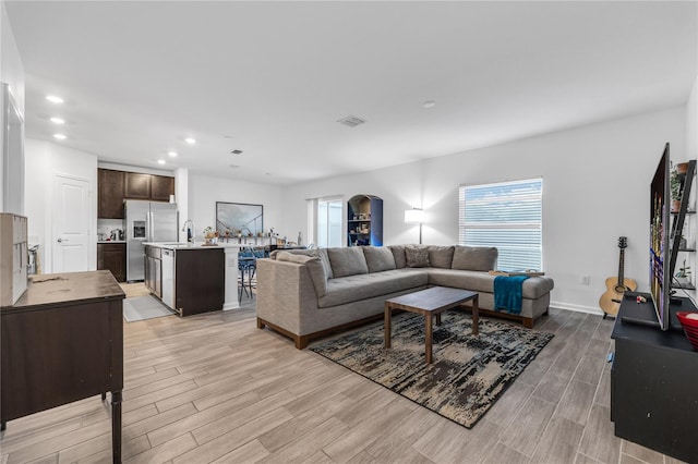 living room featuring light wood-type flooring