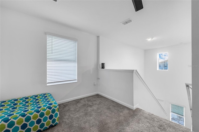 1093 Berry Ln, Davenport, FL 33837 - unfurnished bedroom with carpet flooring and baseboards