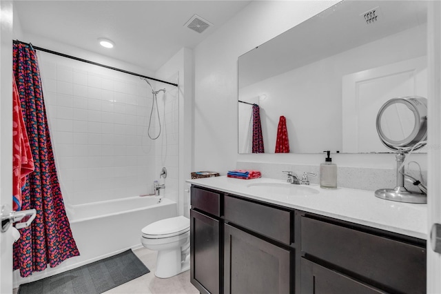 full bathroom featuring vanity, shower / bath combo with shower curtain, and toilet