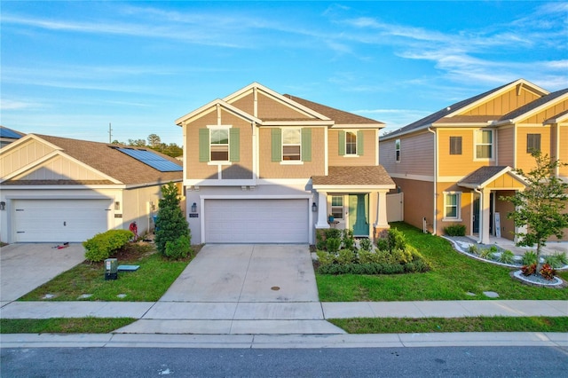 view of front of house with a front yard and a garage