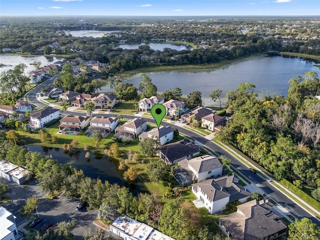 aerial view featuring a residential view and a water view