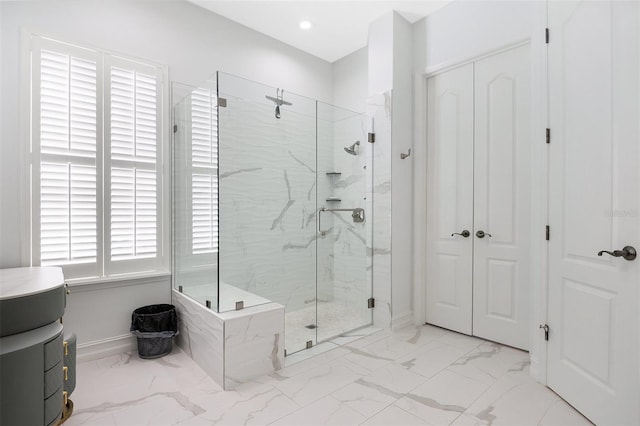 bathroom featuring vanity and walk in shower