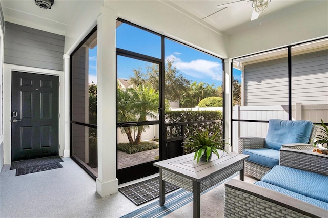 sunroom / solarium with ceiling fan