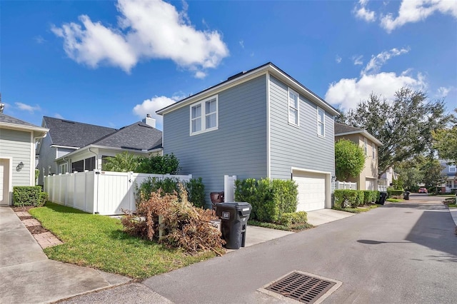 view of side of property featuring a garage