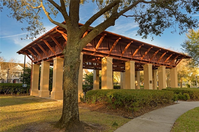 surrounding community featuring a yard