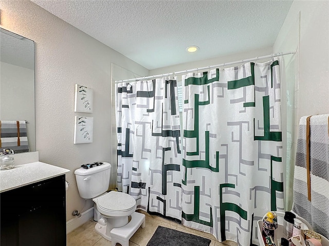 bathroom featuring toilet, a textured ceiling, tile patterned floors, a shower with shower curtain, and vanity