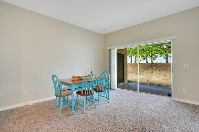 view of carpeted dining room