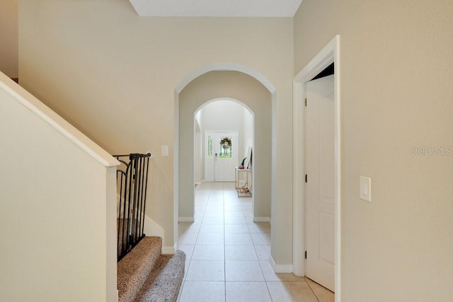 hallway featuring light tile patterned floors