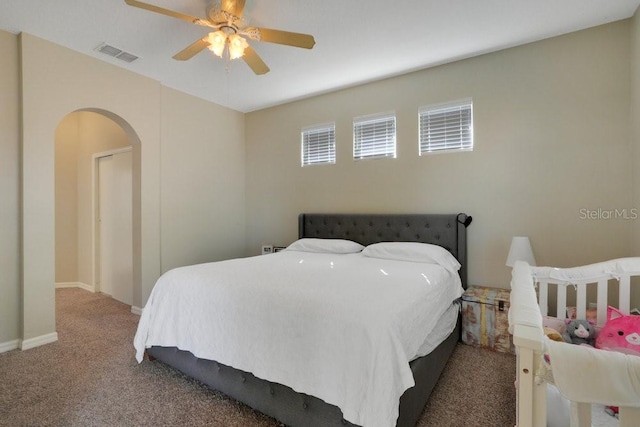 carpeted bedroom featuring ceiling fan