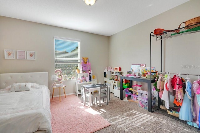 bedroom featuring carpet