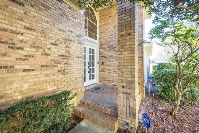 property entrance featuring french doors