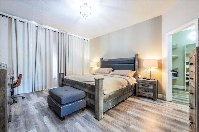 bedroom featuring hardwood / wood-style flooring