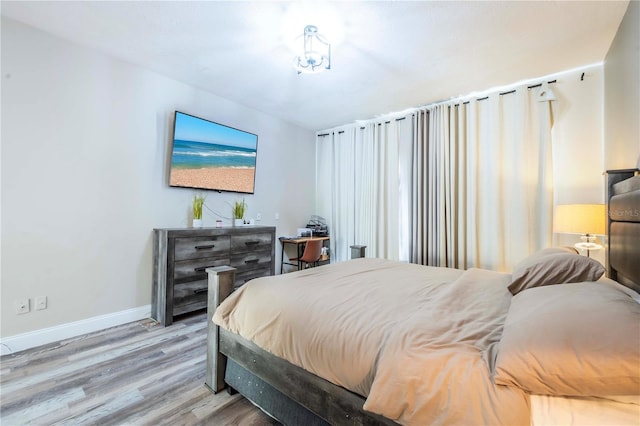 bedroom featuring light wood-type flooring