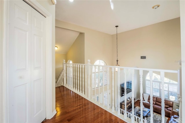 hall with dark hardwood / wood-style floors