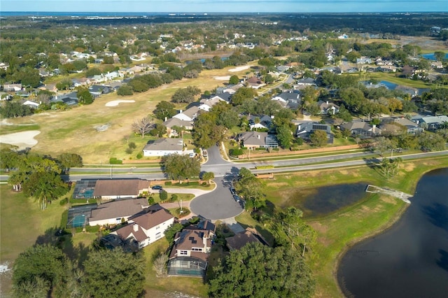 bird's eye view with a water view