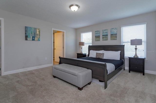 5295 Wildwood Way, Davenport, FL 33837 - bedroom with carpet flooring and baseboards