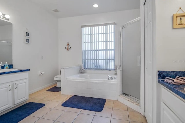 full bathroom with separate shower and tub, tile patterned flooring, vanity, and toilet