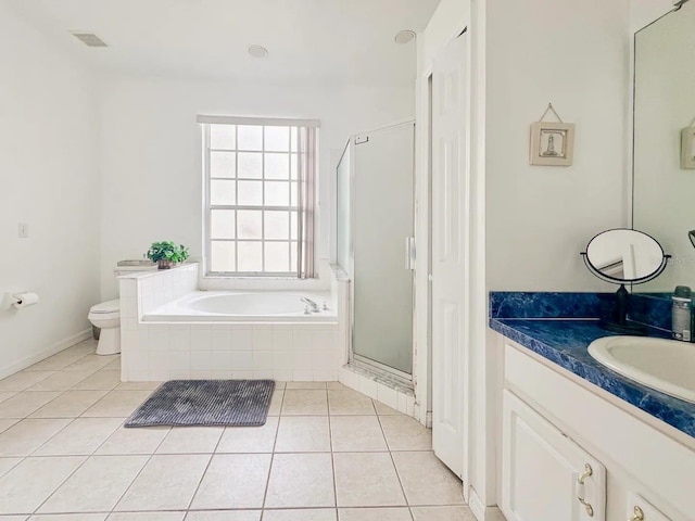 full bathroom featuring tile patterned flooring, vanity, toilet, and shower with separate bathtub