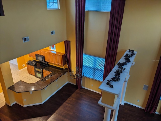 interior space with sink and wood-type flooring